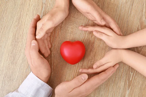 Hands Family Heart Wooden Background — Stock Photo, Image