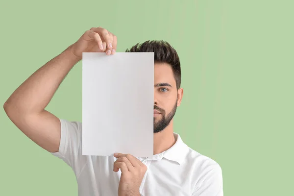 Young Man Blank Paper Sheet Color Background — Stock Photo, Image