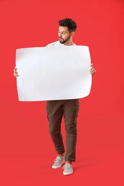 Young Man Blank Paper Sheet Color Background — Stock Photo, Image