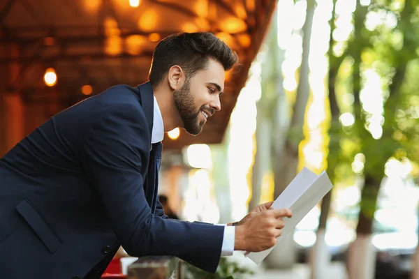 Young Businessman Blank Magazine Outdoors — Stock Photo, Image