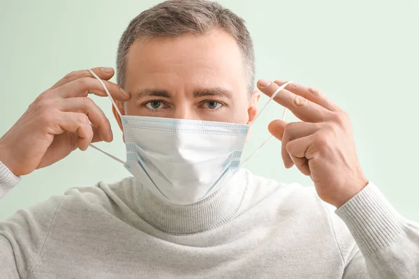 Mature Man Wearing Medical Mask Color Background — Stock Photo, Image