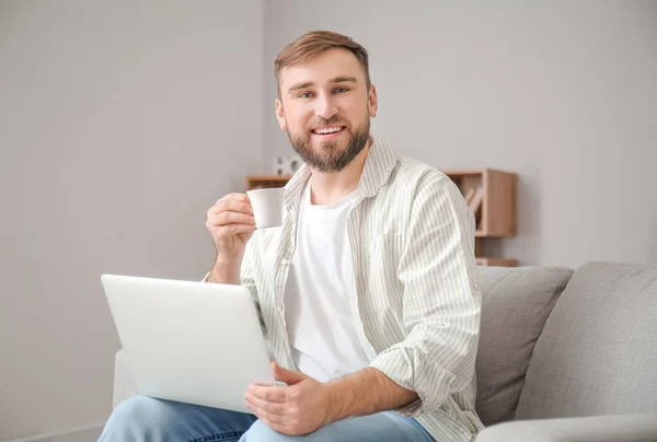 Young Man Laptop Drinking Hot Coffee Home — Stock Photo, Image