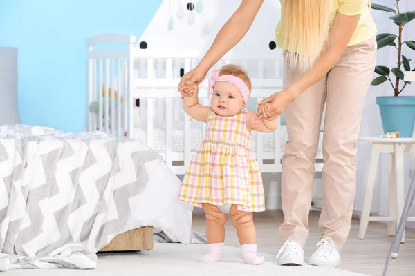 Mother Teaching Her Little Baby Walk Home — Stock Photo, Image