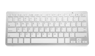 Işık arkaplanındaki modern bilgisayar klavyesi