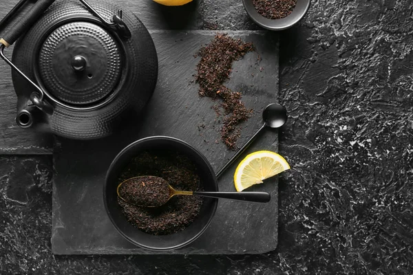 Teapot Bowl Dry Black Tea Lemon Dark Background — Stock Photo, Image