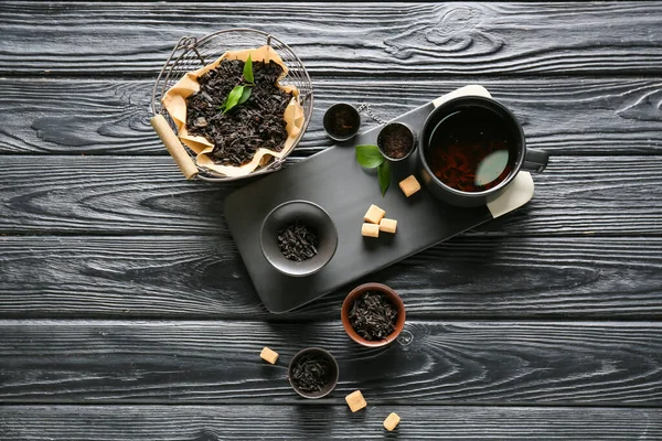 Cup Black Tea Dry Leaves Sugar Wooden Background — Stock Photo, Image