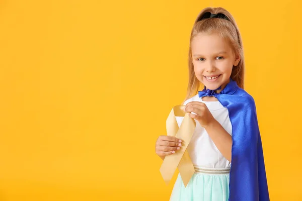 Little Girl Wearing Superhero Costume Golden Ribbon Color Background Childhood — Stock Photo, Image