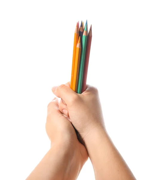 白底上有彩色铅笔的女性手 — 图库照片