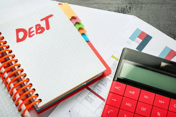 Caderno Com Palavra Debt Documentos Calculadora Tabela — Fotografia de Stock