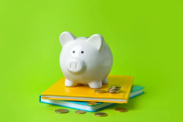 Piggy Bank Coins Notebooks Color Background — Stock Photo, Image