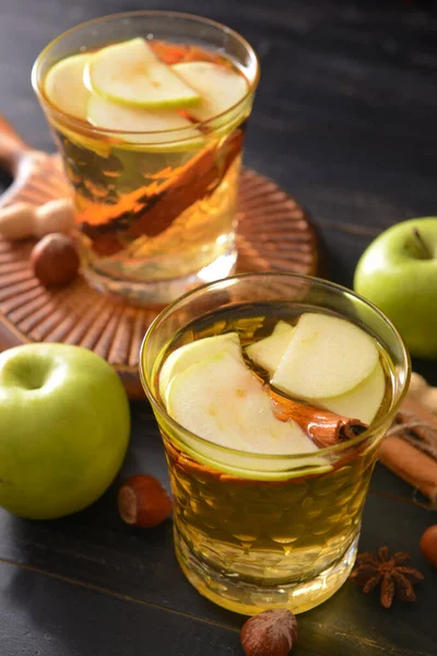 Tasty Apple Drink Cinnamon Glasses Dark Wooden Background — Stock Photo, Image