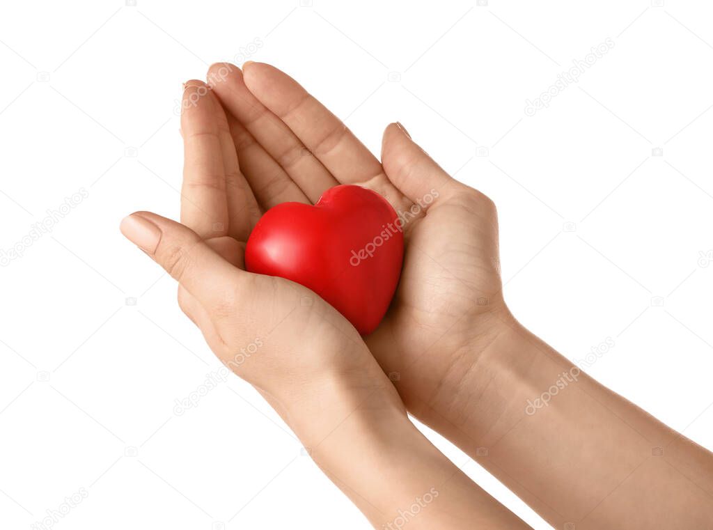 Hands with red heart on white background