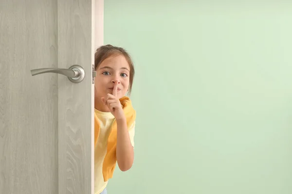 Cute Little Girl Showing Silence Gesture Doorway — Stock Photo, Image
