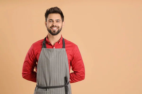 Young Man Wearing Apron Color Background — Stock Photo, Image