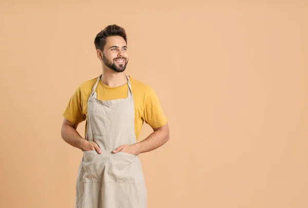 Young Man Wearing Apron Color Background — Stock Photo, Image