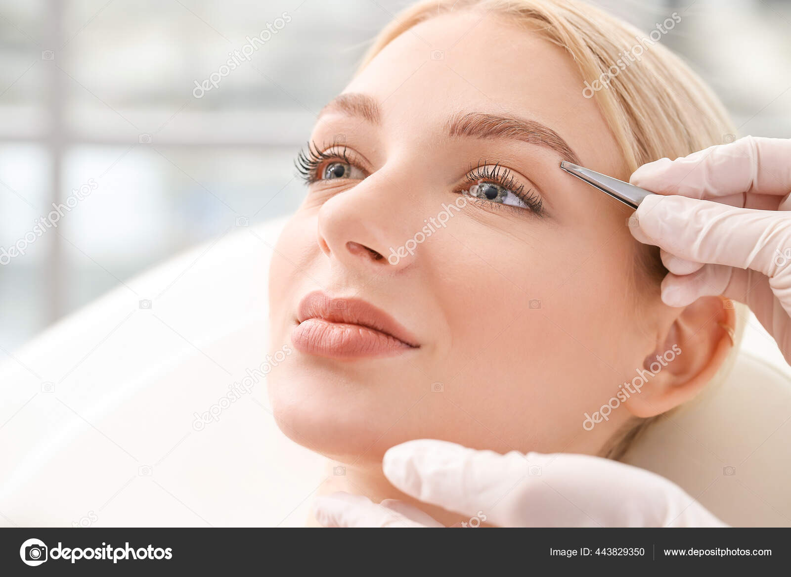 Young Woman Undergoing Eyebrow Correction Procedure Beauty Salon Stock