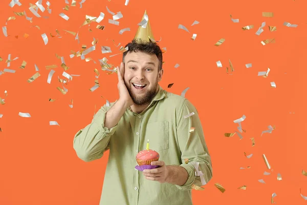 Young Man Celebrating Birthday Color Background — Stock Photo, Image