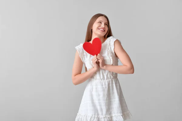 Young Woman Red Heart Grey Background — Stock Photo, Image