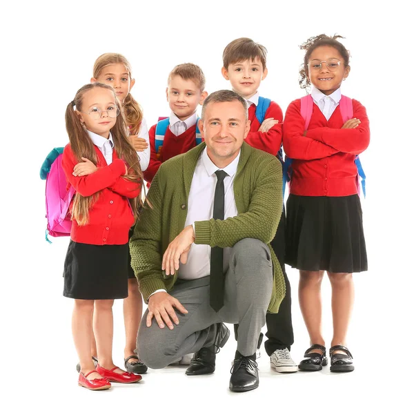 Kleine Schüler Mit Lehrer Auf Weißem Hintergrund — Stockfoto