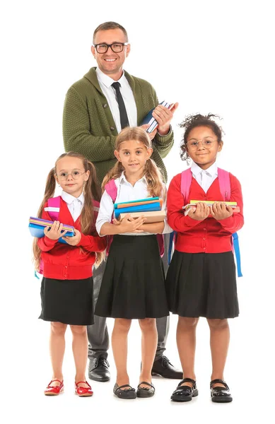 Kleine Schulmädchen Mit Lehrer Auf Weißem Hintergrund — Stockfoto