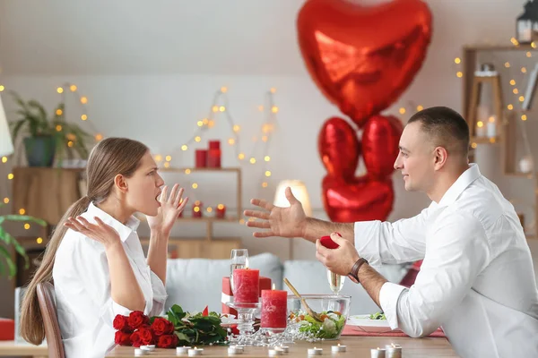 Young Man Proposing His Displeased Beloved Valentine Day Home — Stock Photo, Image