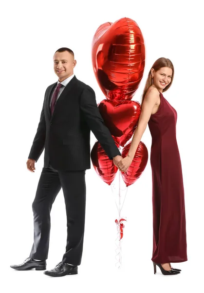 在白色背景上有气球的年轻夫妇 情人节庆祝活动 — 图库照片