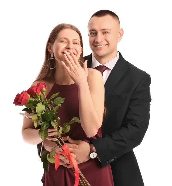 Pareja Joven Con Flores Sobre Fondo Blanco Celebración San Valentín —  Fotos de Stock