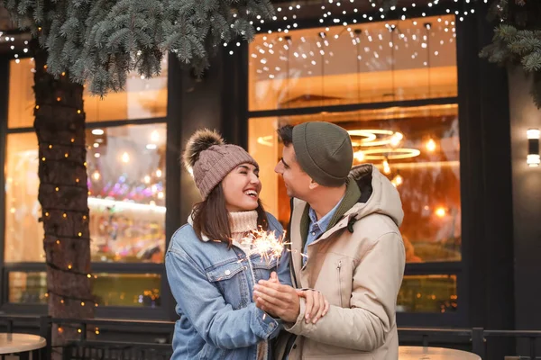 Happy Young Couple Christmas Sparklers Outdoors Winter Day — Stock Photo, Image