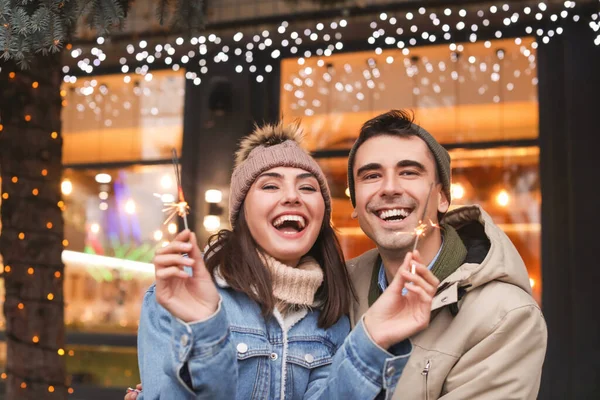 Happy Young Couple Christmas Sparklers Outdoors Winter Day — Stock Photo, Image