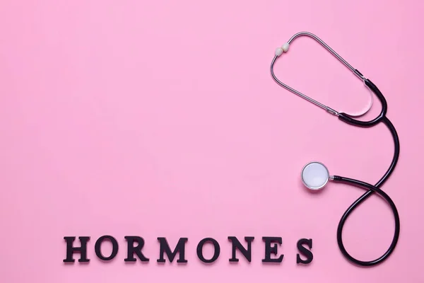 Word Hormones Stethoscope Color Background — Stock Photo, Image