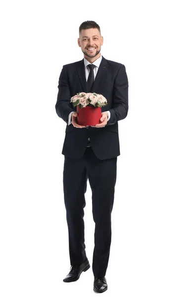 Schöner Mann Mit Einem Strauß Schöner Blumen Auf Weißem Hintergrund — Stockfoto