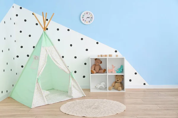 Interior of modern children\'s room with play tent
