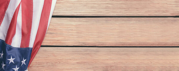 USA flag on wooden background with space for text