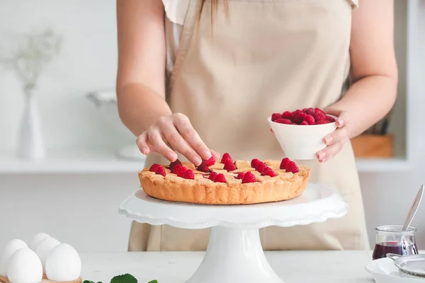 Woman Decorating Tasty Raspberry Pie Kitchen Closeup — Stock Photo, Image