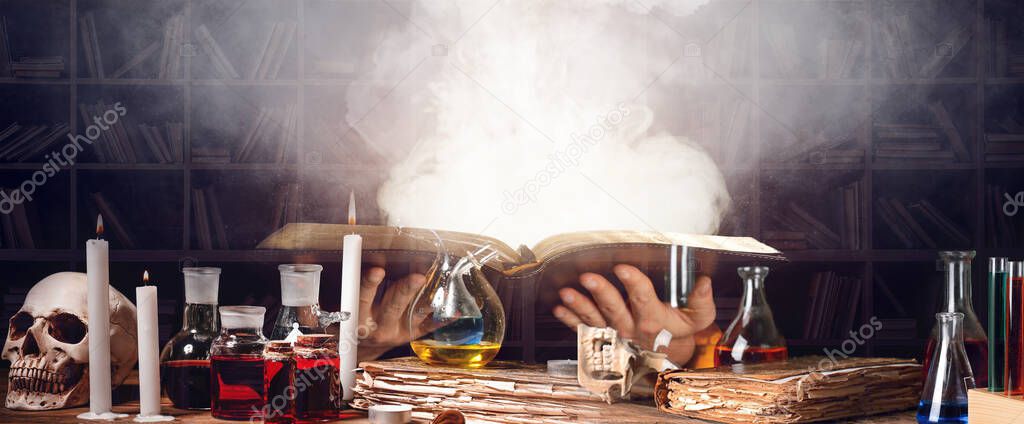 Alchemist making potion in laboratory