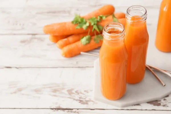 Bottles Healthy Carrot Juice Ingredients Light Wooden Background — Stock Photo, Image