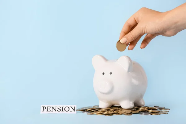 Female Hand Putting Coin Piggy Bank Color Background Concept Pension — Stock Photo, Image