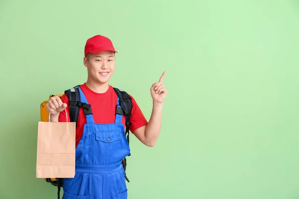 Courier Food Delivery Service Pointing Something Color Background — Stock Photo, Image
