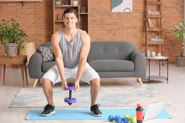 Sporty Young Man Training Dumbbells Home — Stock Photo, Image