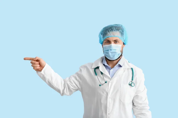 Doctor Medical Mask Pointing Something Color Background — Stock Photo, Image