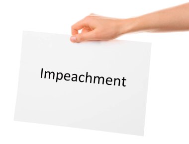 Beyaz arkaplanda IMPEACHMENT yazılı el ele tutuşma kağıdı