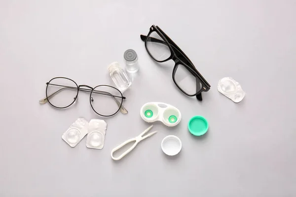 Eyeglasses Tweezers Container Contact Lenses Light Background — Stock Photo, Image