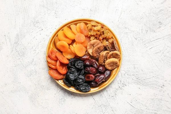 Plate Different Dried Fruits Light Background — Stock Photo, Image