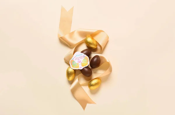 Chocolate Easter Eggs Ribbon Greeting Card Light Background — Stock Photo, Image