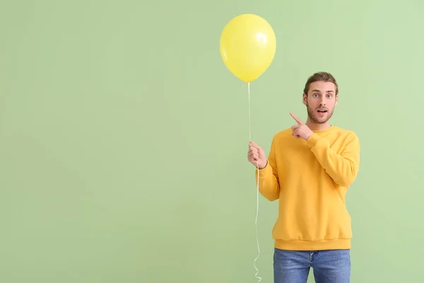Handsome Young Man Balloon Pointing Something Color Background — Stock Photo, Image