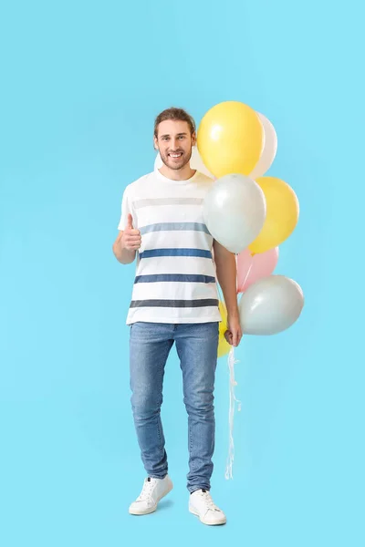 Handsome Young Man Balloons Showing Thumb Color Background — Stock Photo, Image