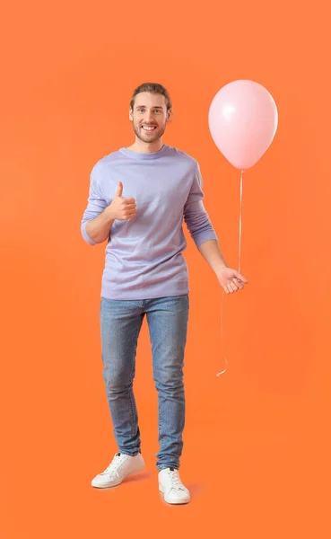 Handsome Young Man Balloon Showing Thumb Color Background — Stock Photo, Image