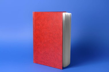 Renk arkaplanı üzerine boş kitap