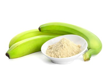 Lezzetli muzlar ve beyaz zemin üzerinde un olan kase.