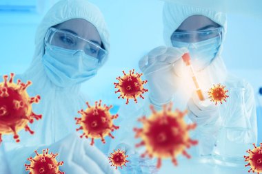Laboratuvarda covid-19 numunesi olan bilim insanları